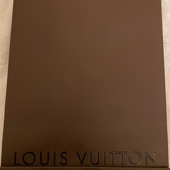 Louis Vuitton authentic gift bag measures approx. 8x 11 inches. Never opened. - Picture 6 of 6